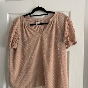 Tan, short sleeved blouse